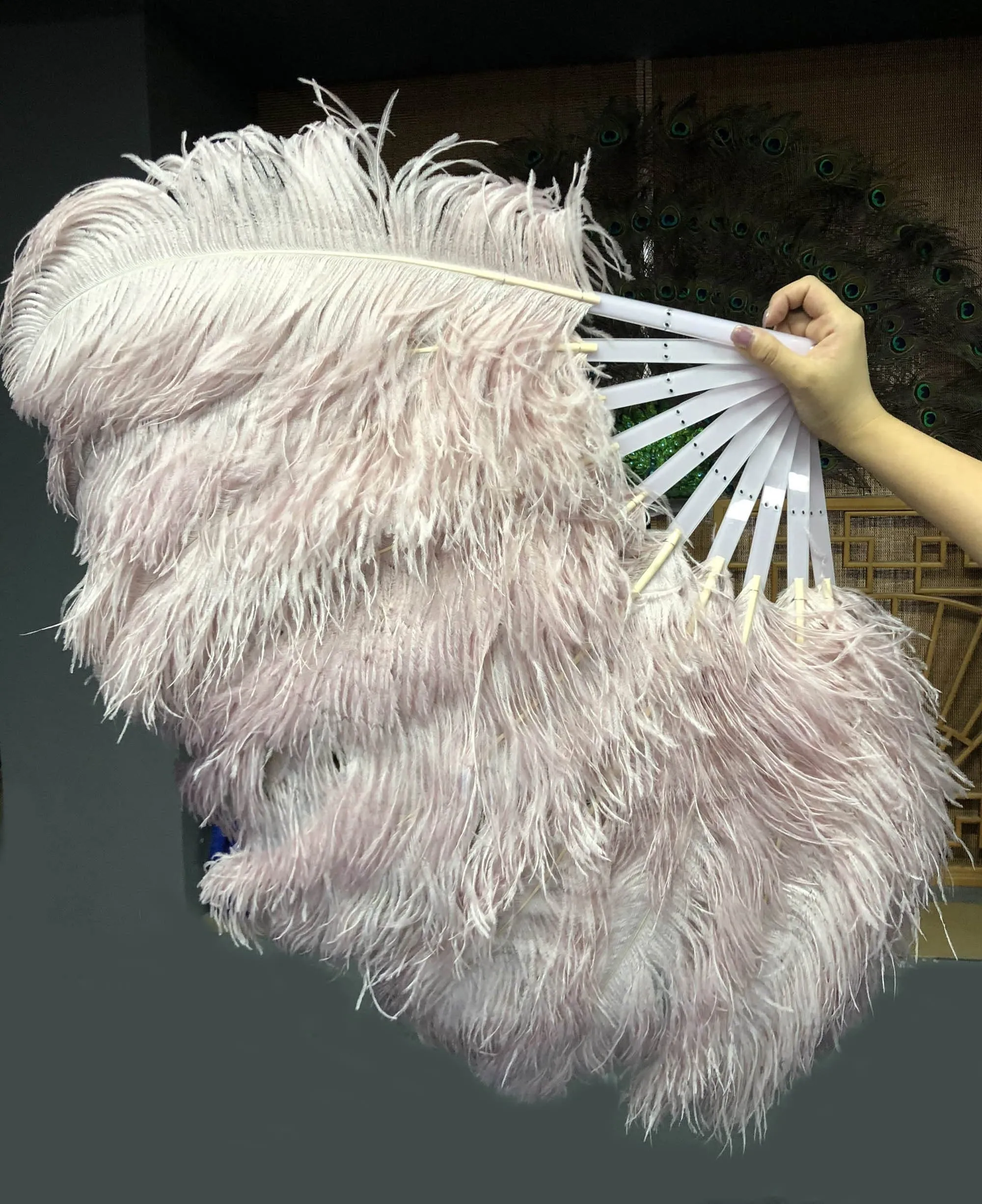 A pair Single layer beige wood Beginner’s Ostrich Feather Fan