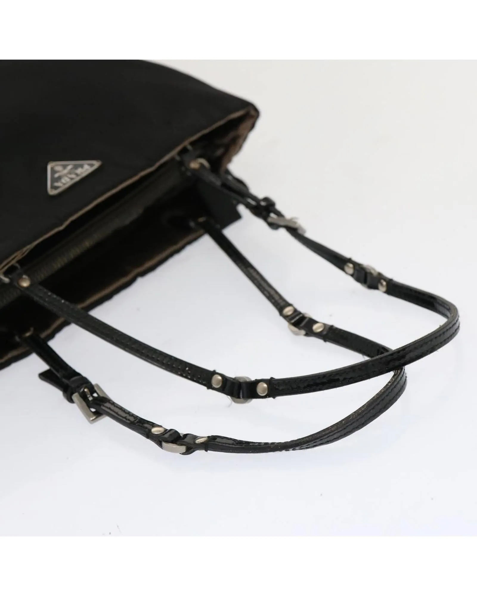 Black Nylon Hand Bag with Scratched Metal Fittings and Rubbing