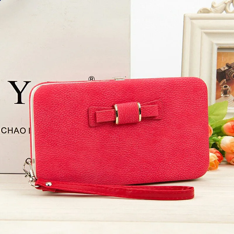 Factory spot low price wholesale new version of women's wallet in the long money bag butterfly knot lunch box woman bag tide