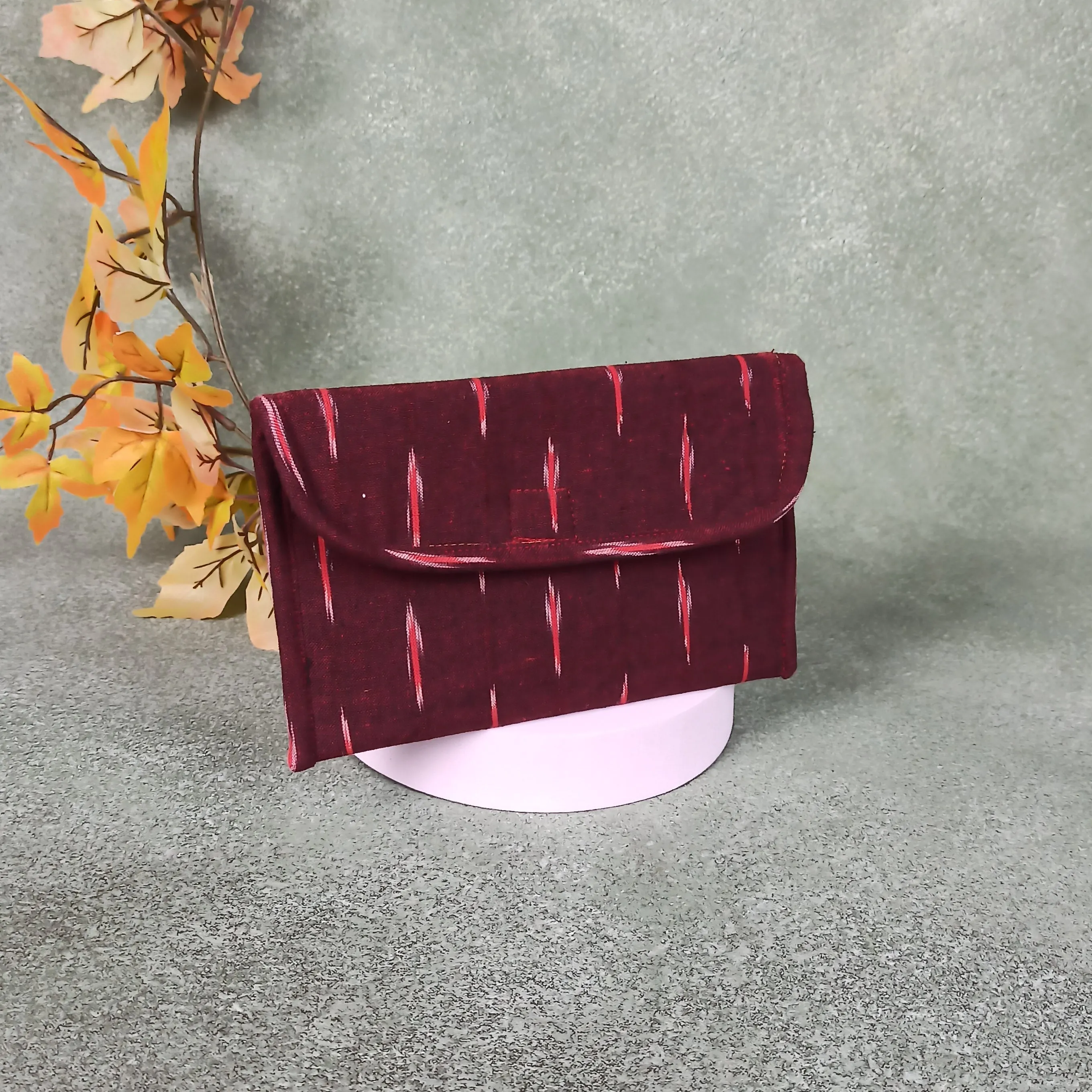 Ikat Clutch Maroon Colour with Red Lines Design.