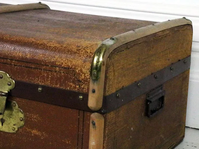 Large brown canvas and wood trunk